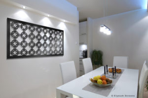 Elysium Decorative Screens House With White Dining Table featuring Metal Decorative Screen as wall art on feature wall